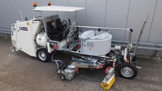 H26 mit drucklosen Behälter (570 ltr) für Thermoplastik mit MultiDotLine® Universal Extruder, schwenkbar unter dem Behälter, Extruder 50 cm